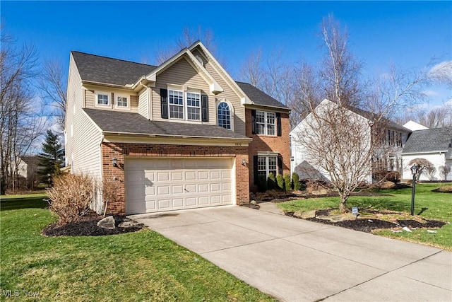 view of front of house with a garage and a front yard