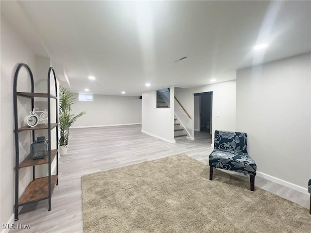 sitting room featuring light hardwood / wood-style flooring