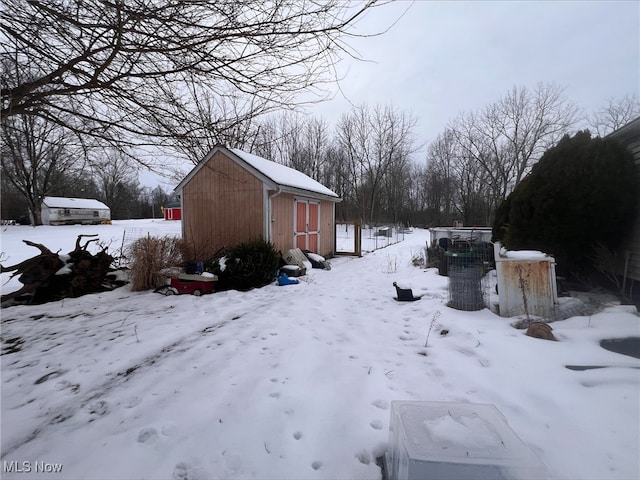 view of yard layered in snow