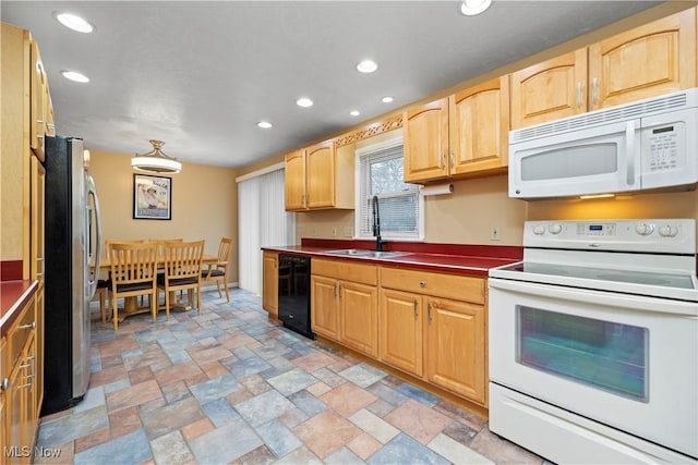 kitchen with sink and white appliances