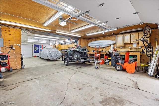 garage featuring a workshop area