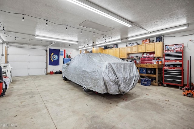 garage featuring a workshop area