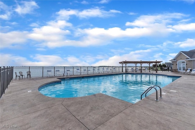 view of pool featuring a patio area and a pergola