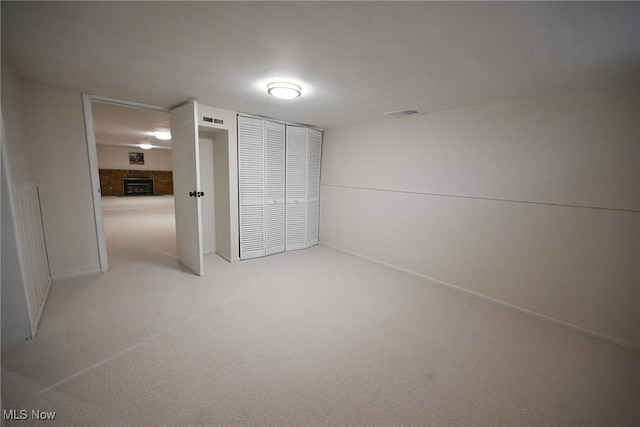 unfurnished bedroom with carpet and a closet