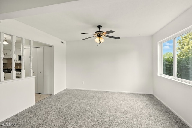 9040 Portage Pointe Dr, Streetsboro, OH 44241 - spare room with light colored carpet and ceiling fan