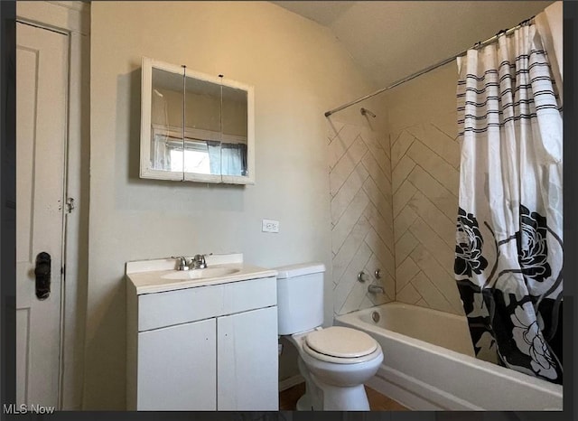 full bathroom with vanity, shower / bathtub combination with curtain, and toilet