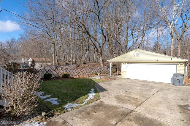 view of yard with a garage