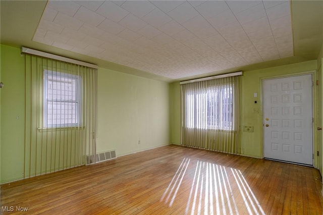 interior space with a healthy amount of sunlight and light hardwood / wood-style floors