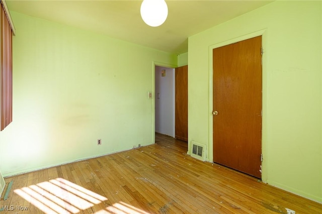 unfurnished bedroom with light hardwood / wood-style flooring