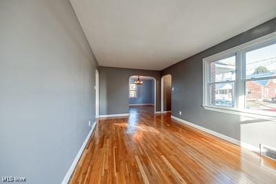 spare room featuring hardwood / wood-style flooring