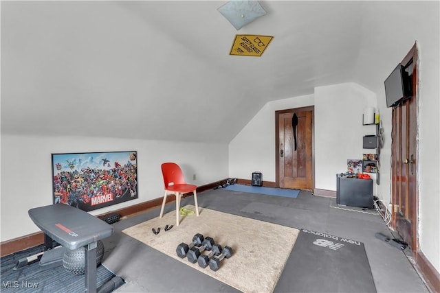 exercise area featuring lofted ceiling