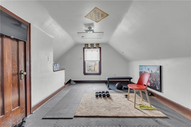 workout area with vaulted ceiling