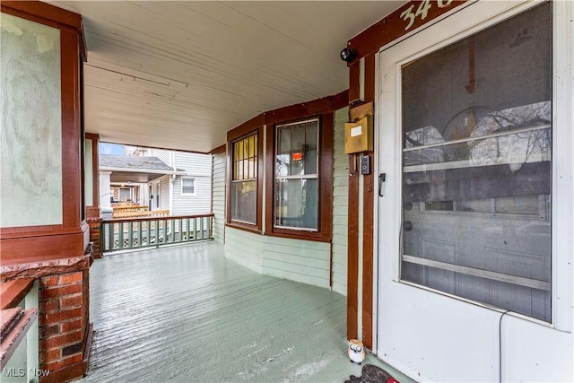 doorway to property with a porch