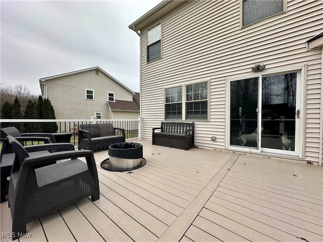 wooden terrace featuring an outdoor hangout area