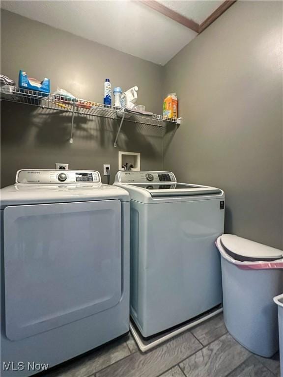 laundry area with washing machine and dryer