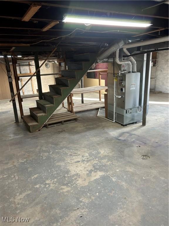 basement featuring heating unit