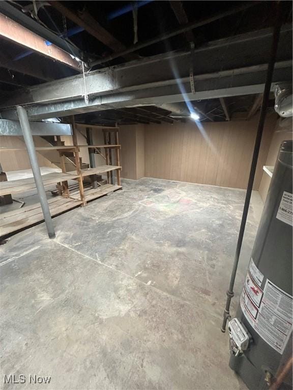 basement featuring gas water heater