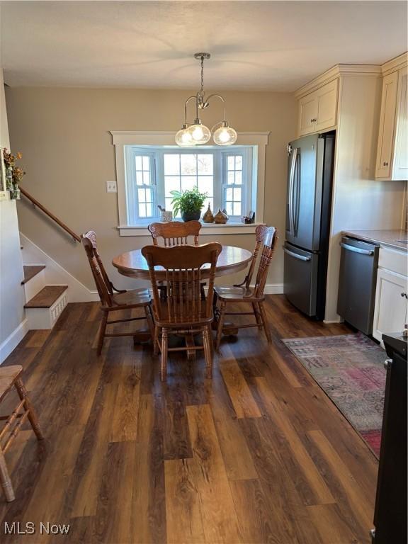 dining room featuring dark hardwood / wood-style flooring