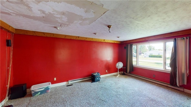 unfurnished room with carpet floors, a baseboard radiator, and a textured ceiling