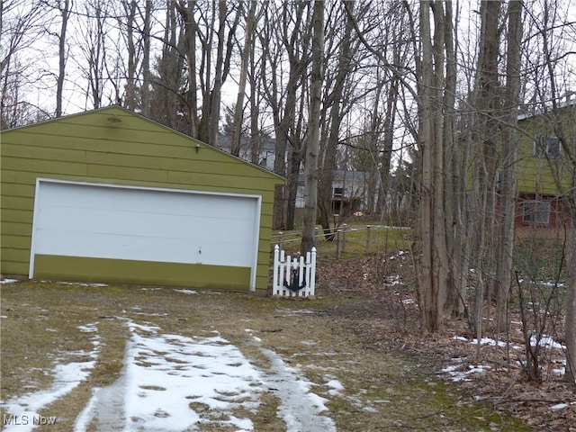 view of snow covered garage