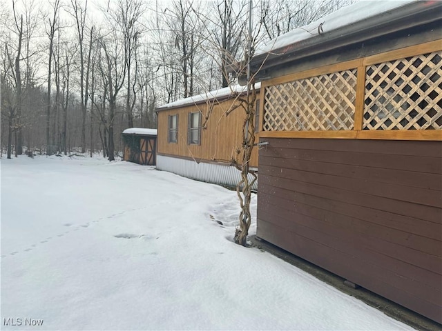 view of snow covered property