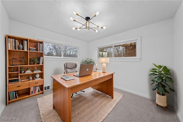 office with a chandelier