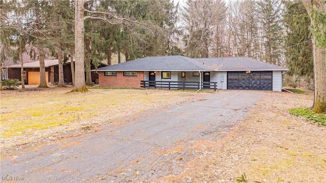 ranch-style house featuring a garage