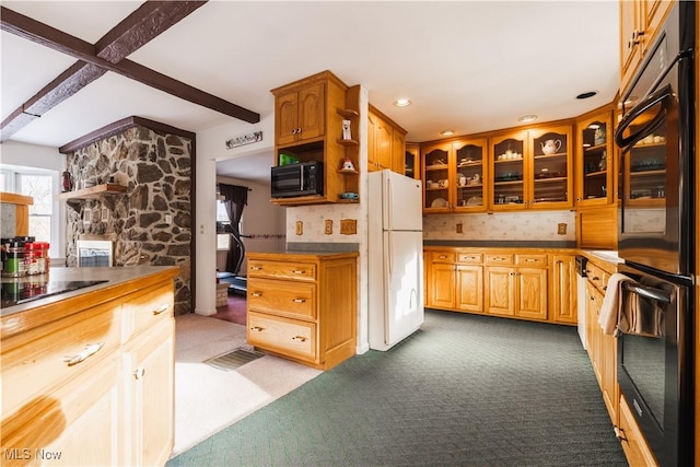 kitchen featuring beam ceiling, black appliances, and dark colored carpet