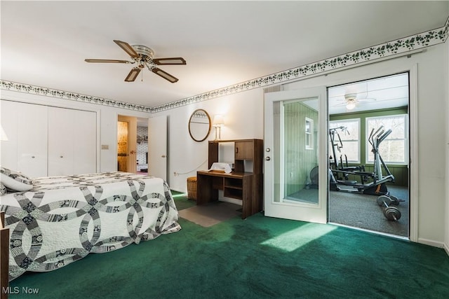 bedroom featuring ceiling fan, access to exterior, dark carpet, and a closet