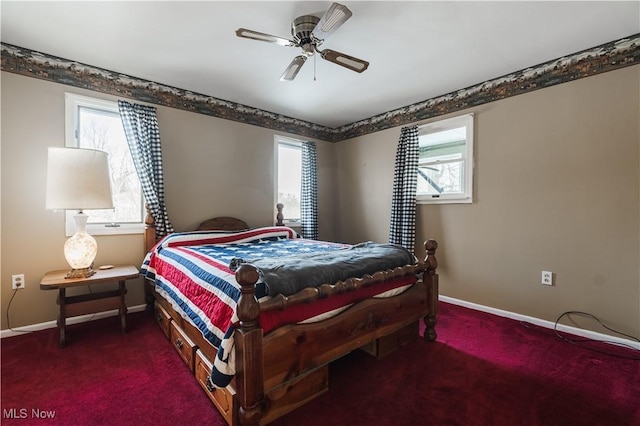 bedroom with dark colored carpet and ceiling fan