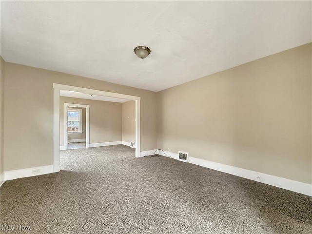 spare room with carpet flooring