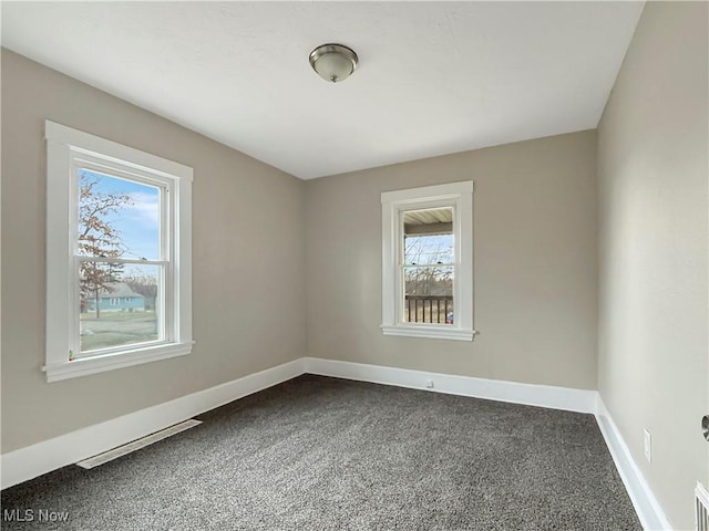 view of carpeted spare room