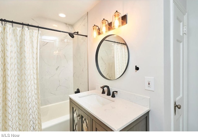 bathroom with vanity and shower / bath combination with curtain