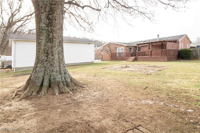 view of yard featuring a deck