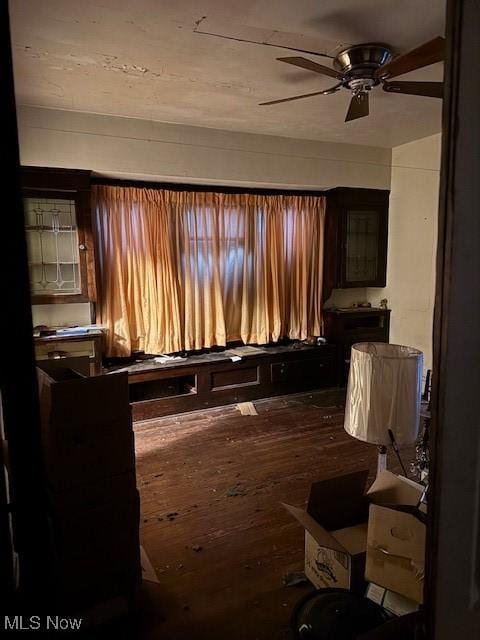 misc room featuring hardwood / wood-style flooring and ceiling fan