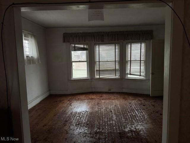 empty room featuring hardwood / wood-style flooring