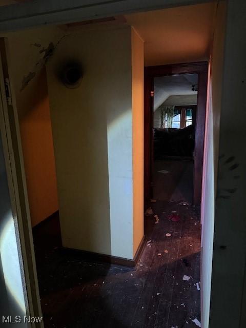 hallway featuring dark wood-type flooring