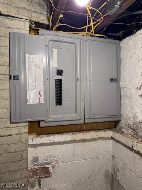 utility room featuring electric panel