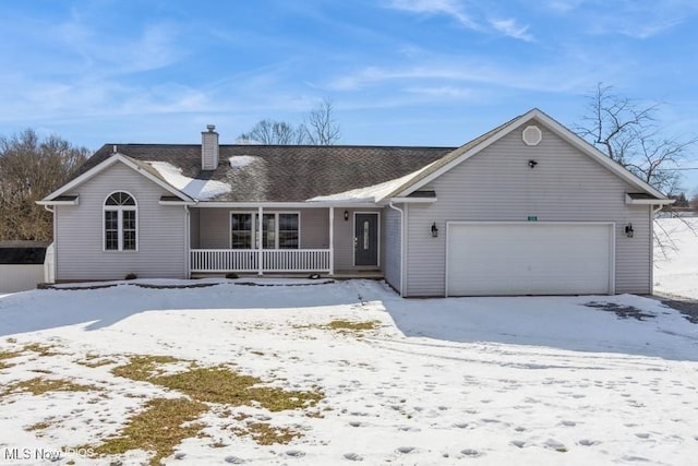 ranch-style house with a porch and a garage