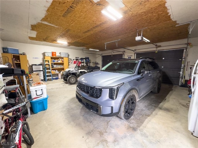 garage featuring a garage door opener