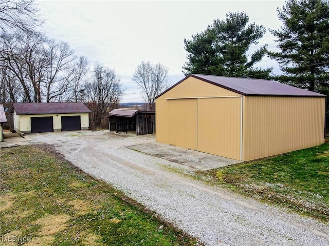 view of outdoor structure with a garage