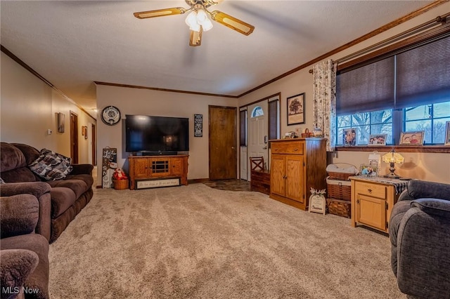 living room featuring ceiling fan, light colored carpet, and ornamental molding