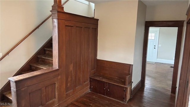 stairway featuring hardwood / wood-style flooring