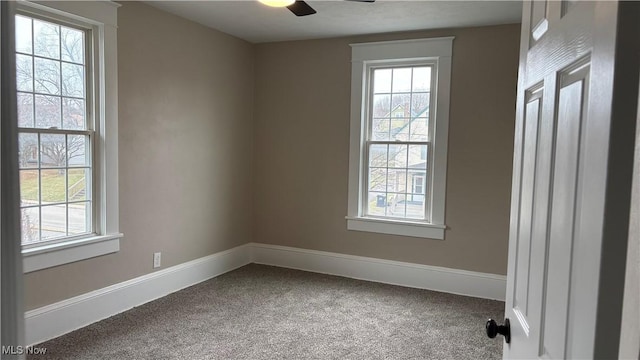 unfurnished room featuring carpet floors and ceiling fan