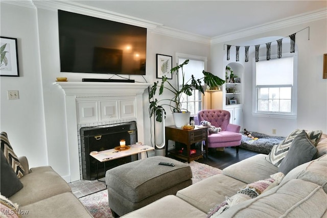 living room with ornamental molding and light wood-type flooring