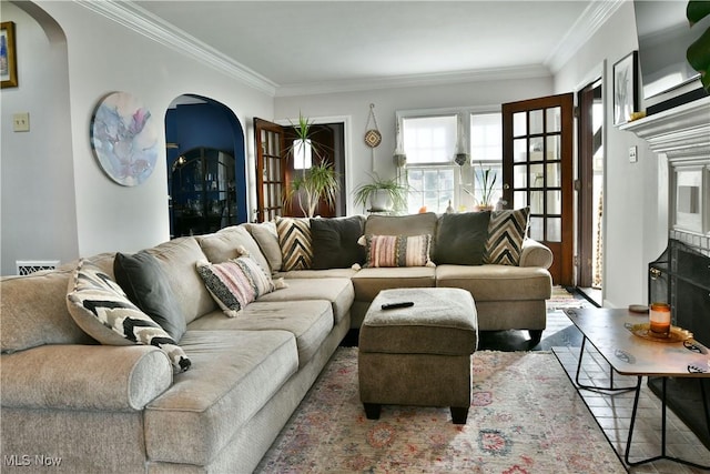 living room featuring crown molding