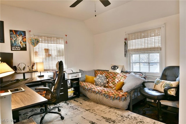 office area with lofted ceiling and ceiling fan