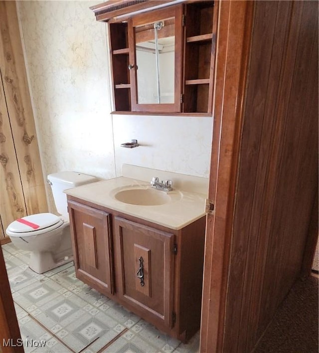 bathroom with vanity and toilet