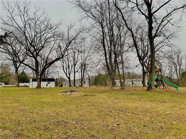 view of yard with a playground