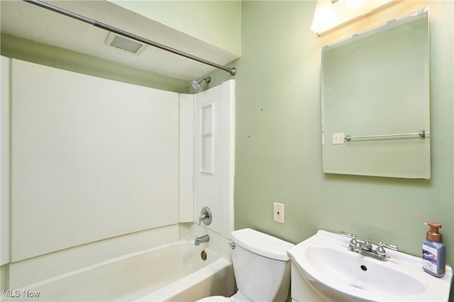 full bathroom featuring sink, toilet, and shower / bath combination